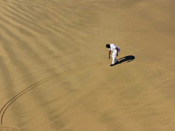 Sand artist by Robin Cooter