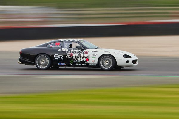 Racing car in motion on track
