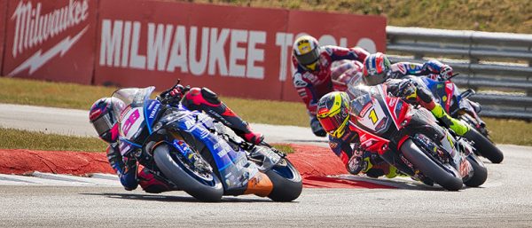 Motorbikes racing on a track